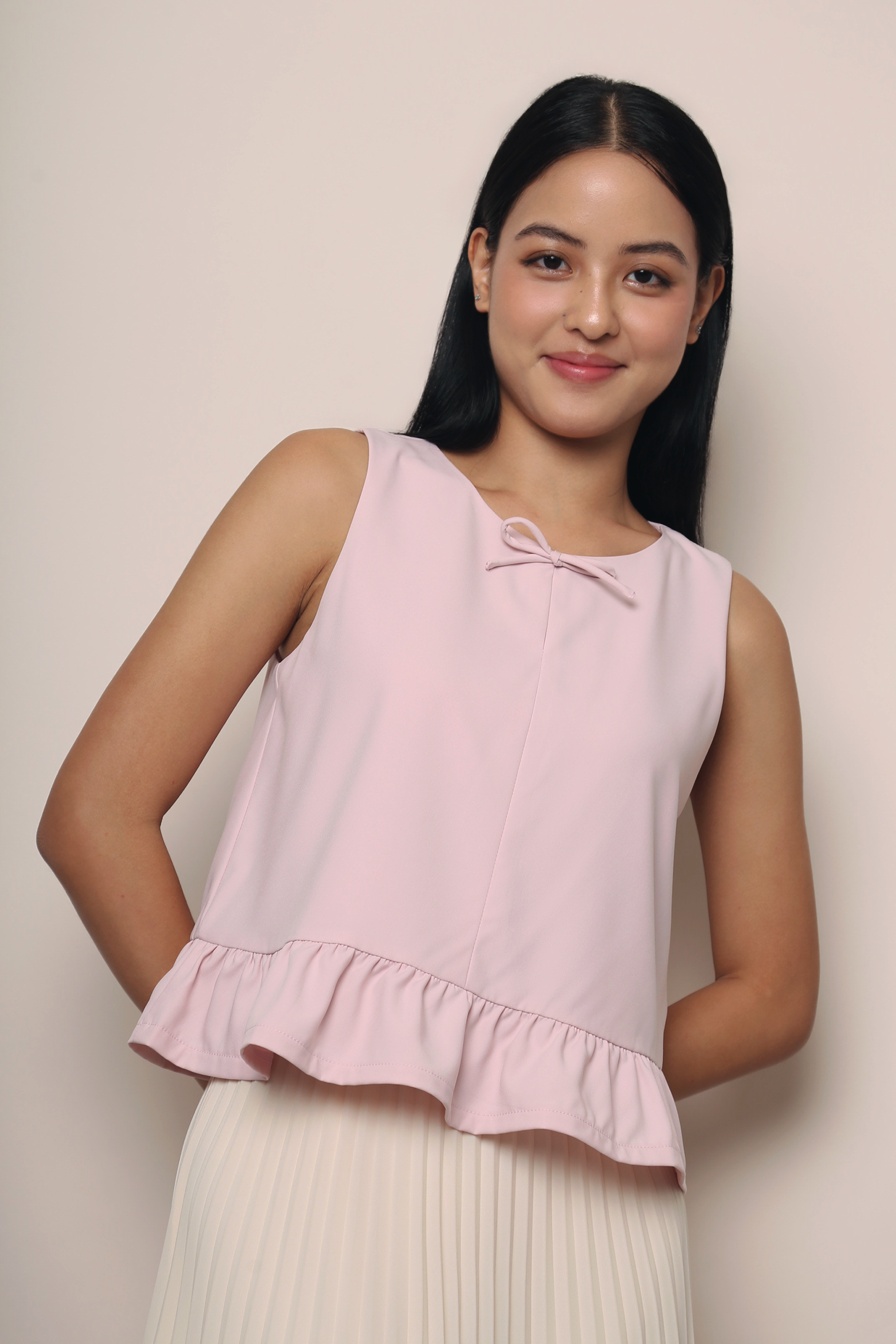 Lotus Bow Peplum Top Blush