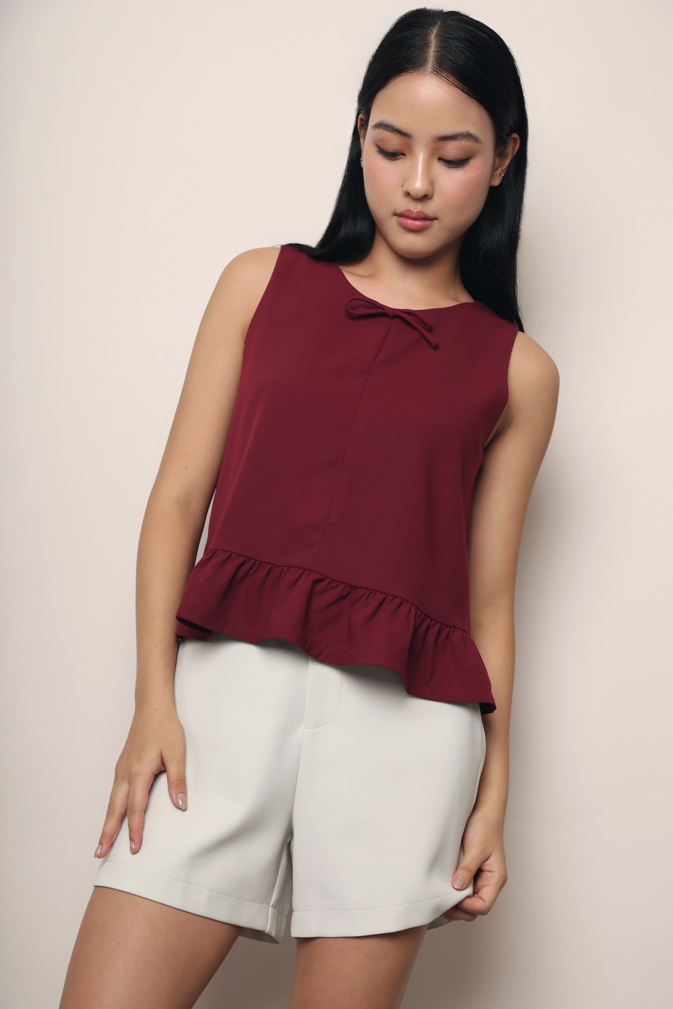 Lotus Bow Peplum Top Wine